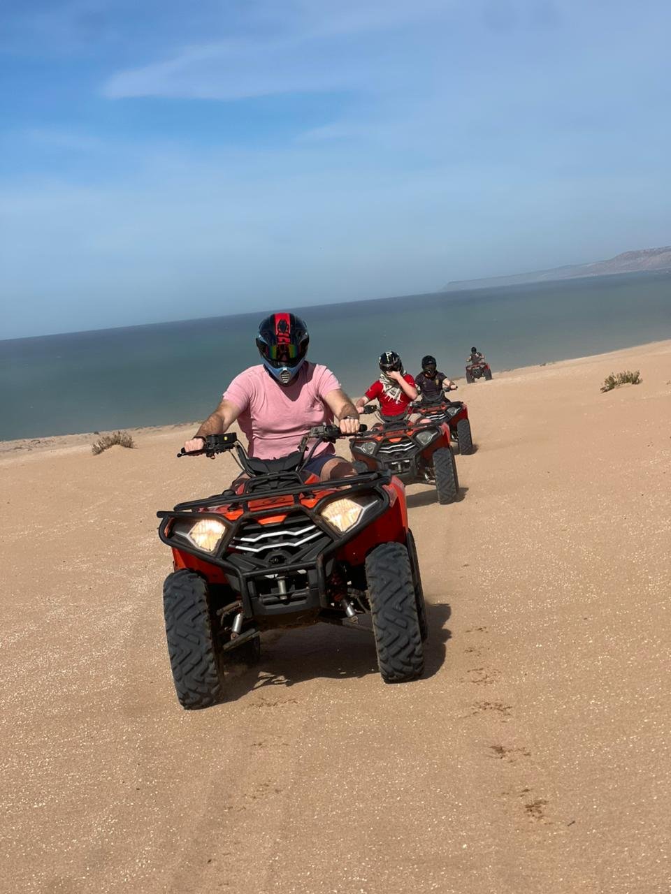 Desert landscape with quad bikes
